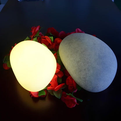 Luz de jardim em forma de seixo