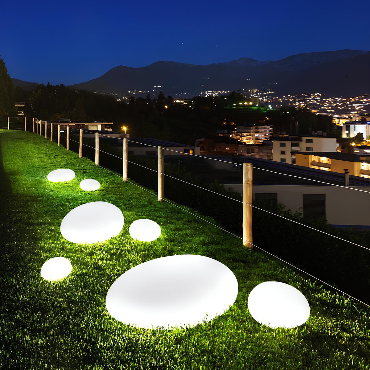 Luz de jardim em forma de seixo