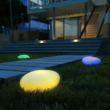 Luz de jardim em forma de seixo
