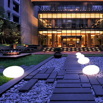 Luz de jardim em forma de seixo
