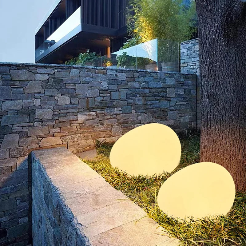Luz de jardim em forma de seixo