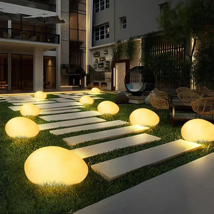 Luz de jardim em forma de seixo