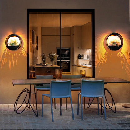 Potvormige wandlamp op zonne-energie