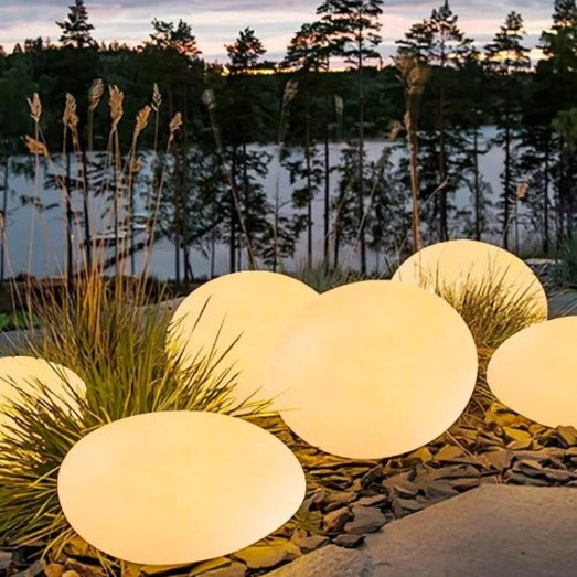 Luz de jardim em forma de seixo